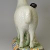 Yorkshire type prattware pottery large sheep, lambs and an attendant, circa 1820