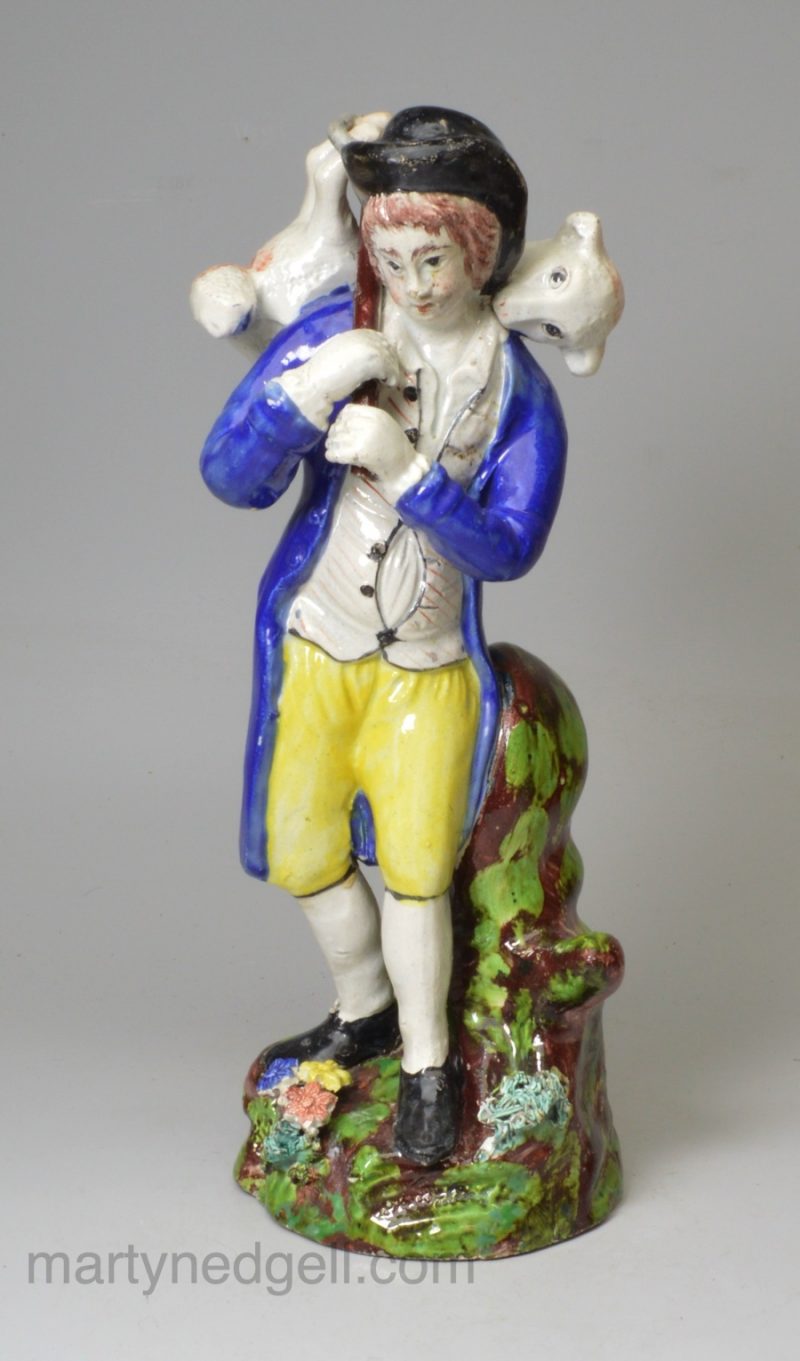 Staffordshire pearlware pottery figure decorated with overglaze enamels, 'Lost Sheep Found', circa 1820