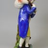 Staffordshire pearlware pottery figure decorated with overglaze enamels, 'Lost Sheep Found', circa 1820