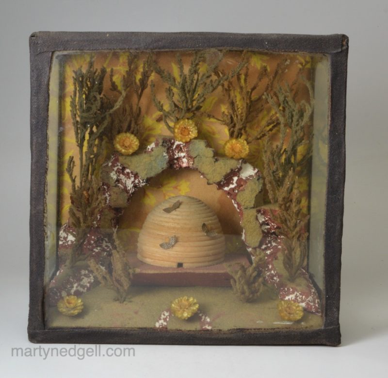 Diorama of a beehive with bees in wax, circa 1830