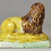 Pearlware pottery lion decorated with colours under the glaze, circa 1800