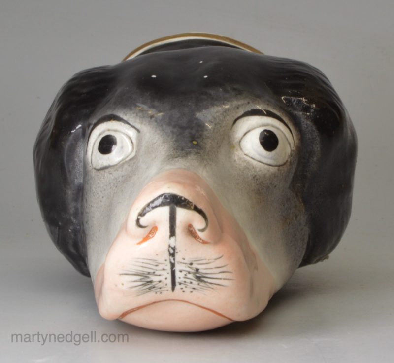 Staffordshire porcelain dog head stirrup cup, circa 1850