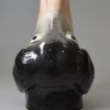 Staffordshire porcelain dog head stirrup cup, circa 1850