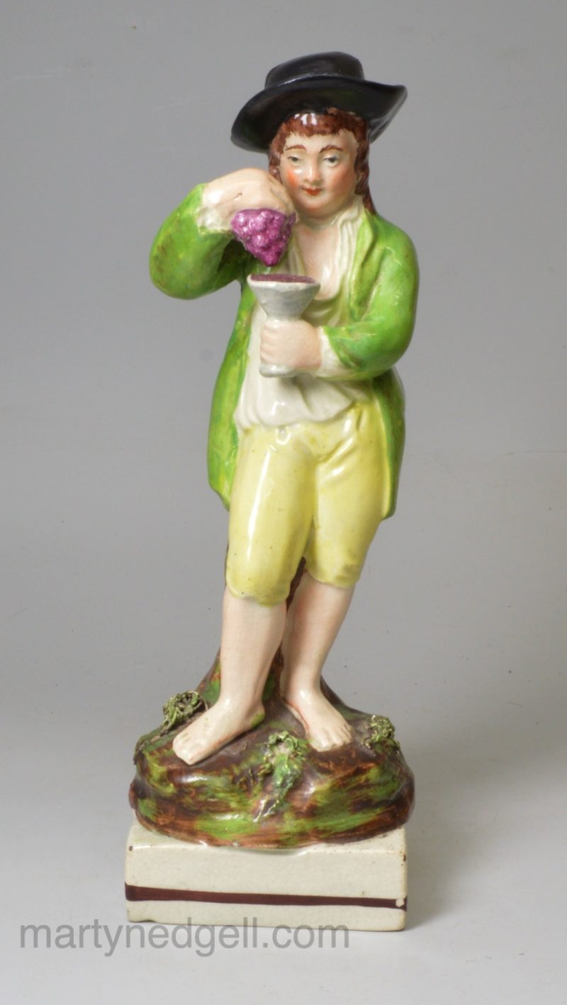 Staffordshire pearlware pottery figure of Autumn, circa 1820