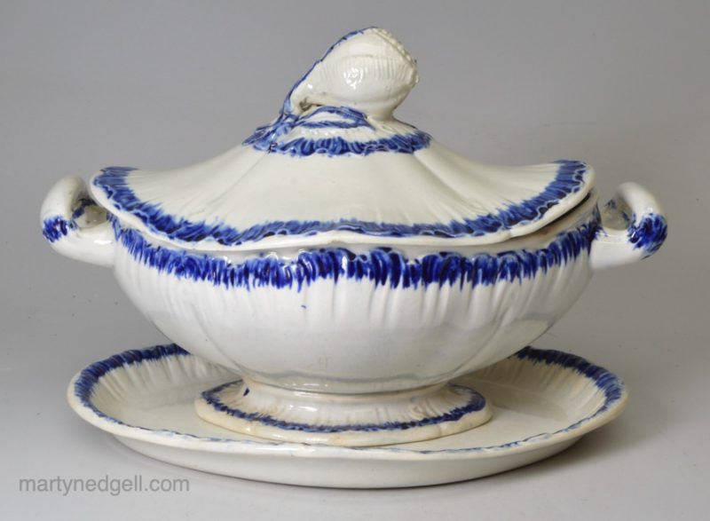 Pearlware pottery blue shell edge sauce tureen, stand and cover, circa 1790 Spode Pottery