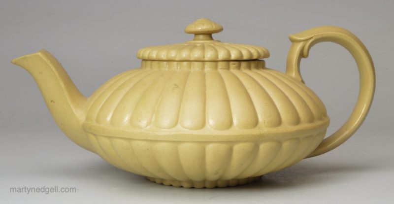 Small buff stoneware teapot, circa 1830