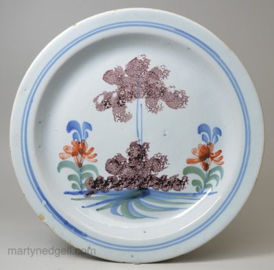 London delft pancake polychrome plate, circa 1730