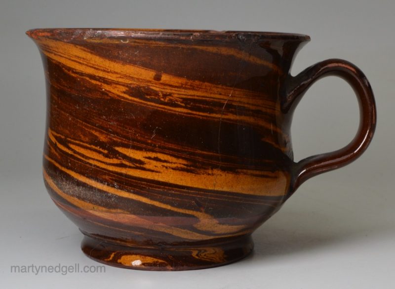 Large Halifax type mug covered with swirled slip, circa 1850