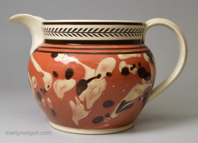 Mochaware jug with splash slip decoration, circa 1820