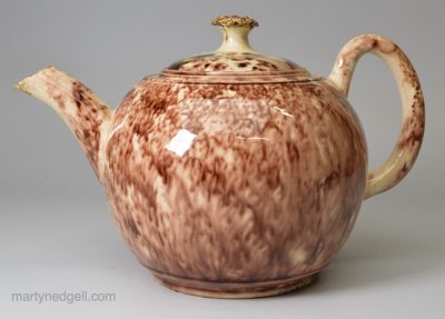 Creamware teapot decorated with Whieldon type glazes, replacement lid, circa 1770