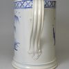 Pearlware pottery quart mug decorated in blue under the glaze, circa 1800