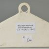 Glazed white terracotta 'SHERRY' bin label, circa 1840