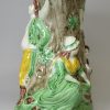 Pearlware pottery fair Hebe jug decorated with colours under the glaze, circa 1795, probably Wood family