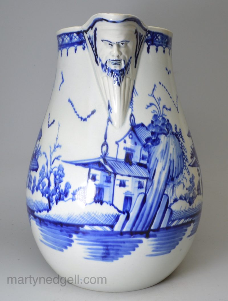 Large pearlware pottery jug decorated with blue pavilion scene under the glaze, circa 1790