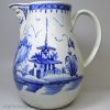 Large pearlware pottery jug decorated with blue pavilion scene under the glaze, circa 1790