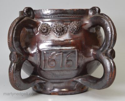 Wrotham brown glazed two handled posset pot dated 1676 potted by John Ifield