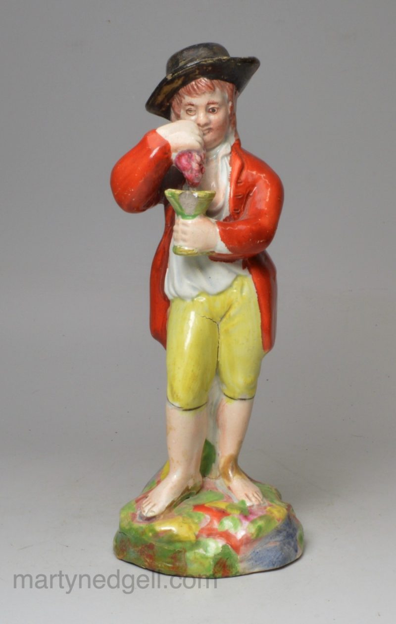 Staffordshire pearlware pottery figure of Autumn, circa 1820