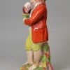 Staffordshire pearlware pottery figure of Autumn, circa 1820