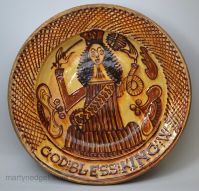 Staffordshire slipware dish, God Bless King W, circa 1695