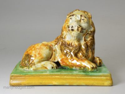 Prattware pottery figure of a lion, circa 1820