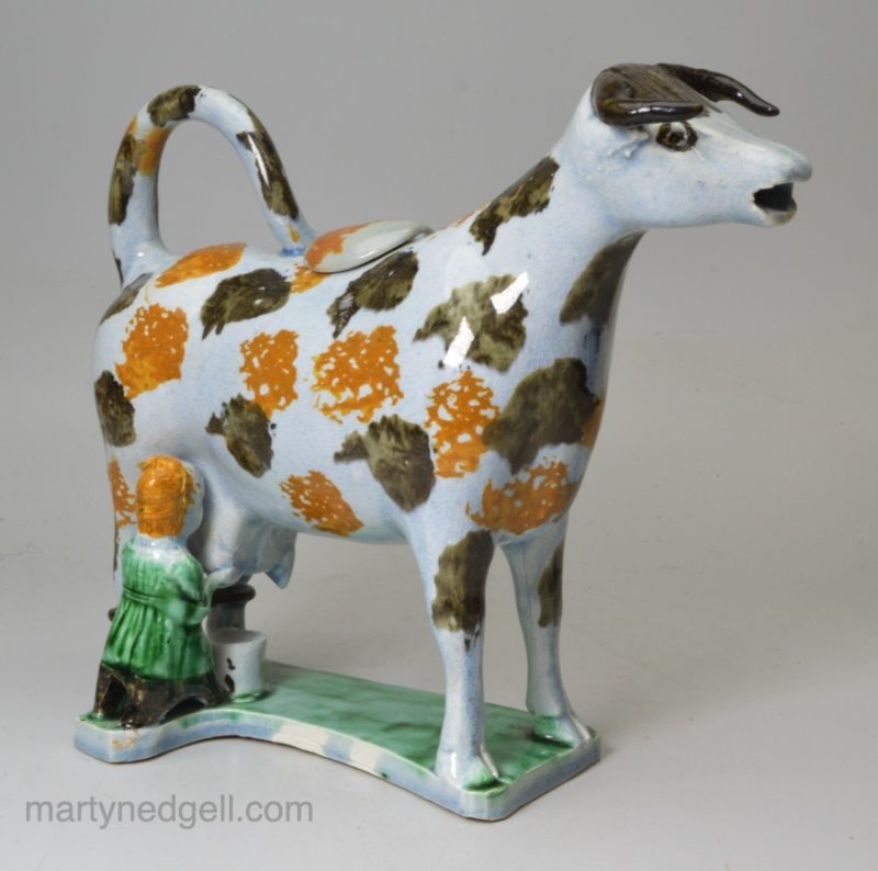 Prattware pottery hobbled cow creamer, circa 1820