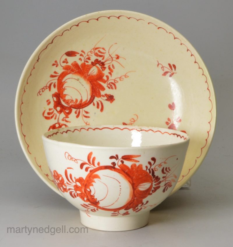 Creamware pottery tea bowl and saucer, circa 1770