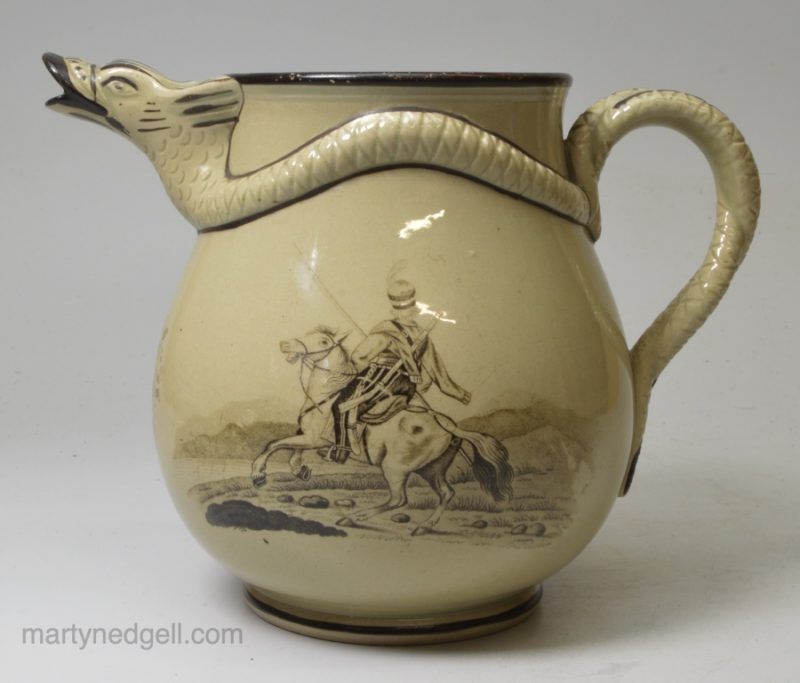 Commemorative Napoleonic drabware pottery jug printed with Russian Cossacks, circa 1812