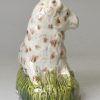 Pearlware pottery sheep decorated in colours under the glaze, circa 1790