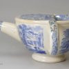 Pearlware pottery feeding cup decorated with a blue transfer under the glaze, circa 1840