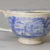 Pearlware pottery feeding cup decorated with a blue transfer under the glaze, circa 1840