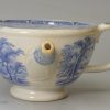 Pearlware pottery feeding cup decorated with a blue transfer under the glaze, circa 1840