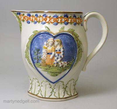 Prattware pottery jug moulded with 'SPORTIVE INNOCENCE' and 'MICHEVIOUS SPORT', circa 1820