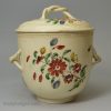 Creamware pottery sugar bowl and cover decorated with enamels over the glaze, circa 1770