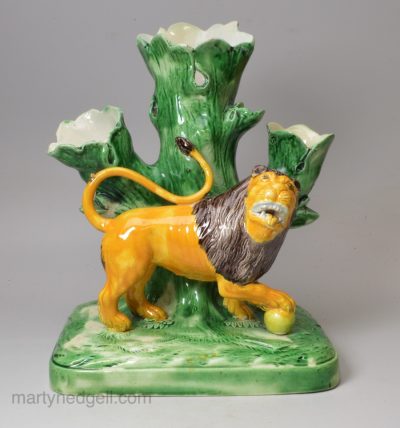 Ralph Wood type lion spill vase decorated with colours under a pearlware glaze, circa 1790