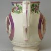 Pearlware pottery commemorative jug moulded with Queen Caroline and decorated with pink lustre, circa 1821