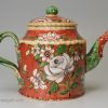 Creamware pottery teapot decorated with enamels of the glaze, circa 1770