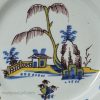 London delft polychrome plate with daffodil border, circa 1740