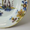 London delft polychrome plate with daffodil border, circa 1740