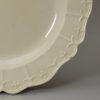 Creamware pottery dinner plate with a moulded border, circa 1780