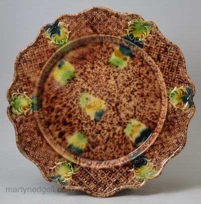 Creamware pottery plate decorated with Whieldon type colours under the glaze, circa 1770