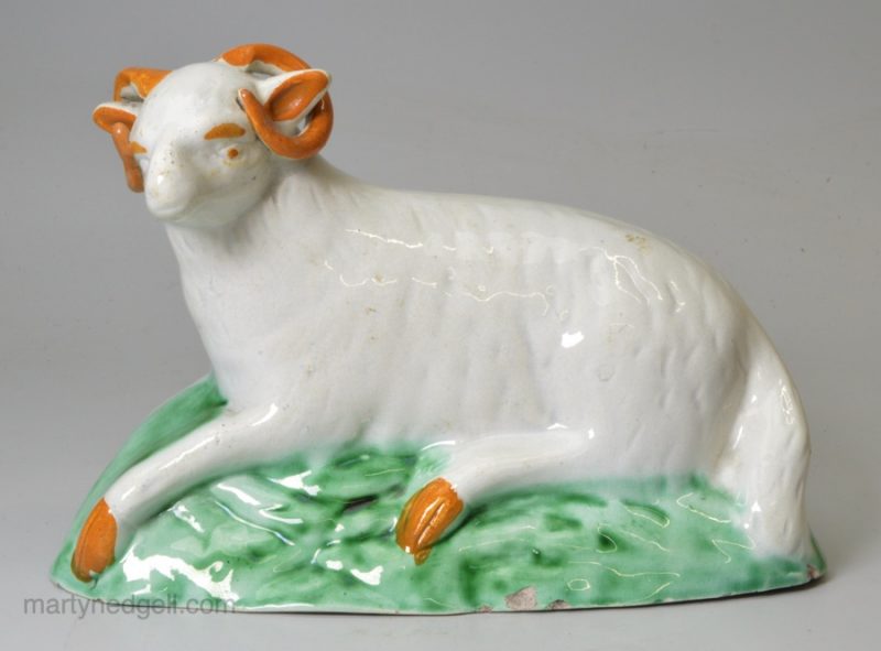 Pearlware pottery figure of a ram decorated with colours under the glaze, circa 1800