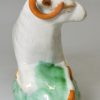 Pearlware pottery figure of a ram decorated with colours under the glaze, circa 1800