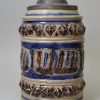 Westerwald saltglaze stoneware tankard decorated with moulded town views, circa 1680