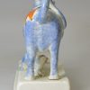 Pearlware pottery cow creamer with sponge decoration under the glaze, circa 1820