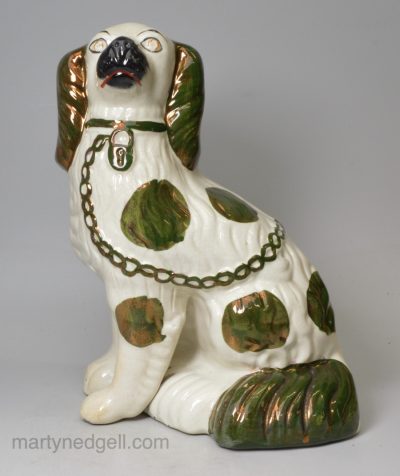 Staffordshire spaniel with copper lustre decoration, circa 1880