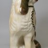 Staffordshire spaniel with copper lustre decoration, circa 1880