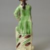 Creamware pottery figure of Lord Rodney decorated with colours under the glaze, circa 1795