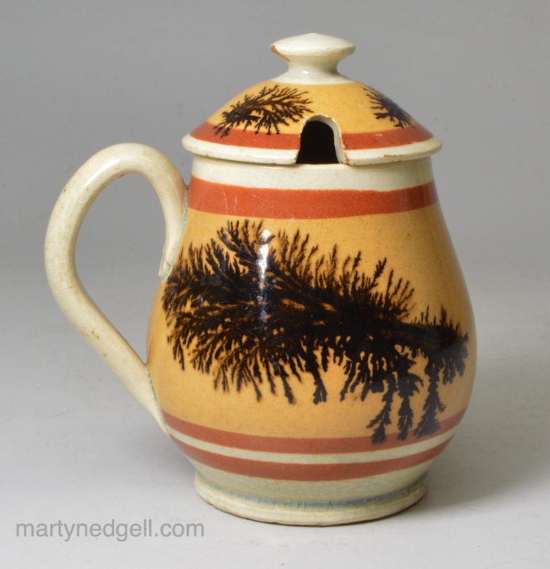 Mocha ware pearlware pottery mustard pot decorated with dendritic markings on mustard slip, circa 1830