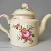 Creamware pottery teapot decorated with enamels over the glaze, circa 1780