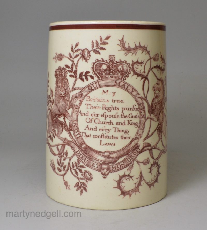 Creamware pottery mug decorated with a patriotic print in brick red, circa 1790